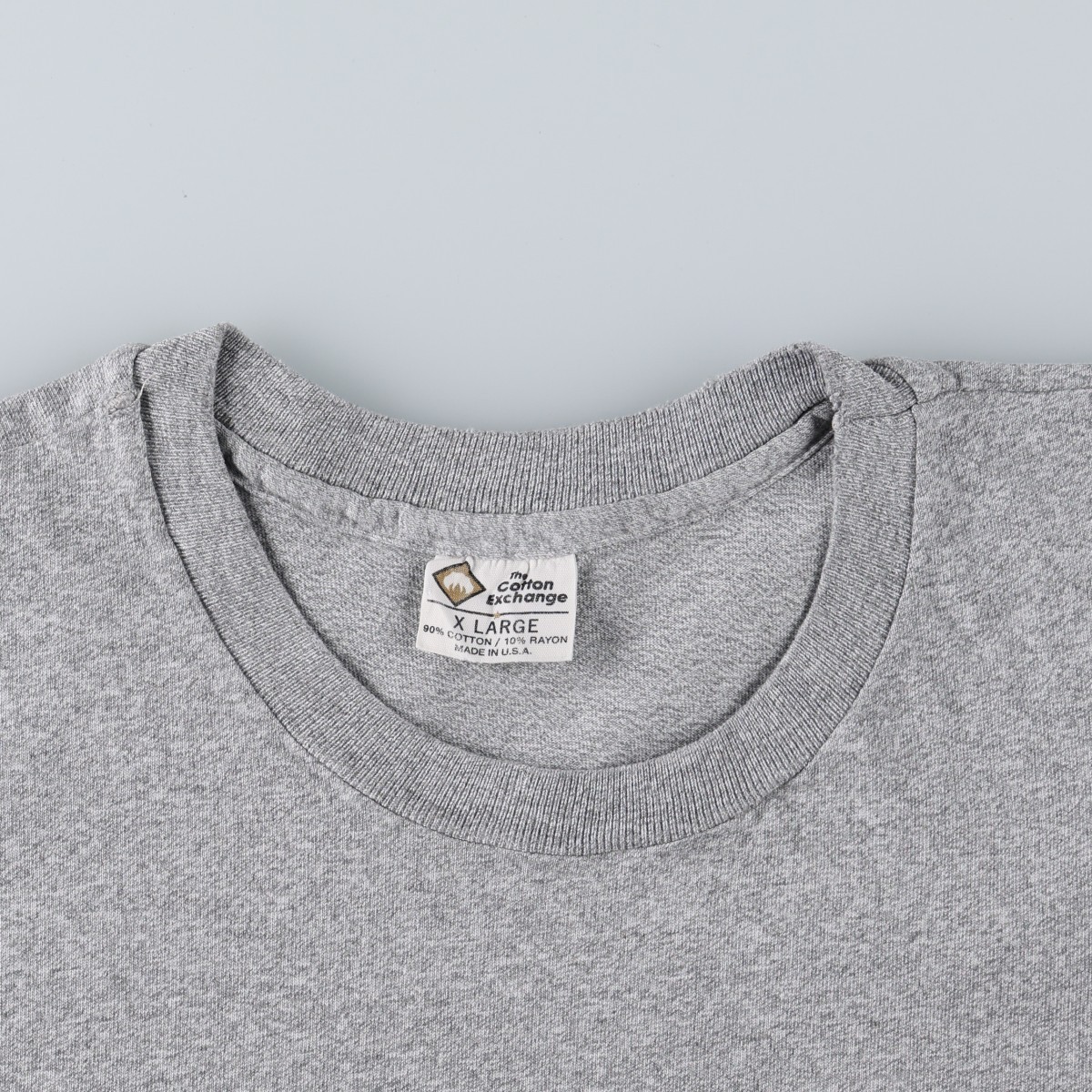 the Cotton Exchange カレッジTシャツ